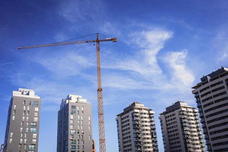 Crane for the construction of a new residential building, real state